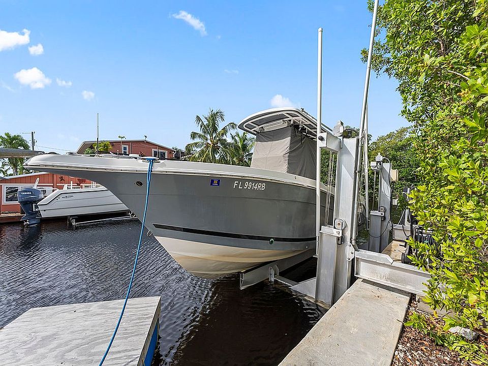 Boat moored beside the property
